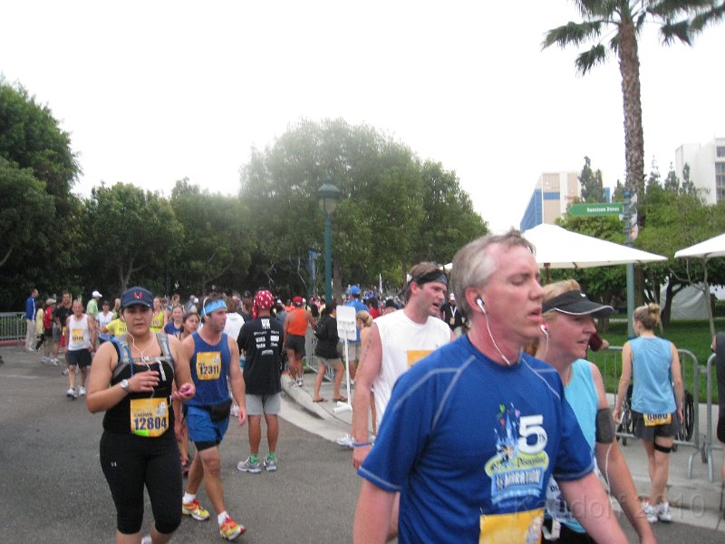 Disneyland 2010 HM Race 0525.JPG - Hot, tired and spent runners litter the course after the finish.